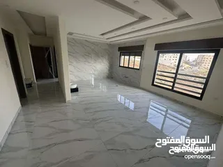  1 شقة طابق أخير مع روف 235م بتشطيبات مميزة في الجبيهه- حي المنصور/ ref 1772