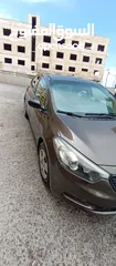  4 KIA Cerato  2015     1600CC لون برونزي بحالة ممتازة