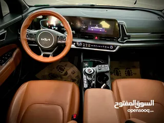  18 كايا سبورتاج  GT Line/2022 فل بدون فتحة سقف  2x4 ///240Hp بنزين + كهرباء  ( Haybrid) 1600cc