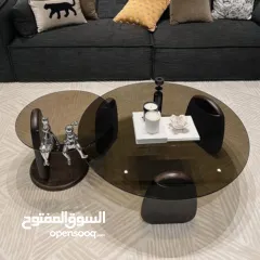  4 طاولة قهوة عصرية بسطح زجاجي أنيييق وتصميم حديث   هالطاولة بتجمع بين التصميم العصري والبساطة الراقية