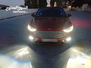  7 بسم الله ما شاء الله   فورد فيوجن 2017 لون خمري مميز للبيع ورقم مميز 7جيد فحص كامل للبيع