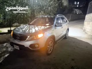  9 كيا سيرنتو4×4ديزل متور2200 فول اضافات فتحه بانوراما هوك مسجل بترخيص