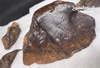  2 Jabal Kamel Hadidi meteorites, Tripoli, Libya, weight: one kilogram and 200 gram