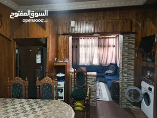  2 شقه ارضيه للبيع كاش او اقساط عن طريق البنك العربي الإسلامي الدولي في عمان حي نزال على الشارع الرئيسي
