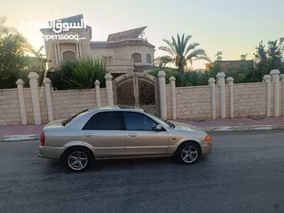 2 مازدا 323 اتماتك فتحه اصليه تحفه بمعنا الكلمه بسعر حرق 29500 ألف نقدا بدل وارد فحص نخب