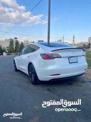  4 Tesla Model 3