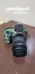  1 كاميرا كانون دي 80