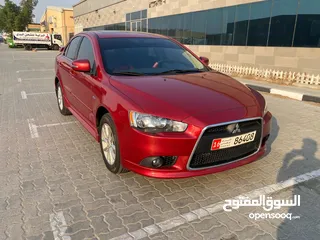  2 Mitsubishi Lancer... Model 2015...gcc specifications... Super clean