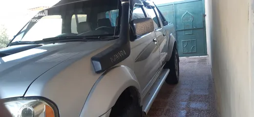  15 بكب نيسان بلدي 4×4 فورويل موديل 2004