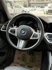  10 ترخيص 2022 BMW  330e  محرك 2000 هايبرد plug in/يقطع على الشحنه 50 كيلو متر  297 حصان