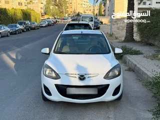  15 مازدا زوم 2 موديل 2012 فحص كامل 7 جيد ولا ملاحظة لون ابيض قاطعة مسافة 100 الف كيلو فقط (استخدام شخصي