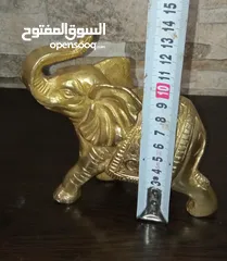  11 فيل نحاس منقوش