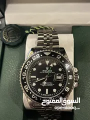  4 ساعة رولكس كوبي ماستر مختومه لون مميز عقارب وتاريخ مع علبتها وكيس رولكس