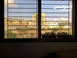  2 شقه للبيع مرج الحمام نزول ناعور قرب قاعة ميموريز والدفاع المدني منطقه هادئه مطلة