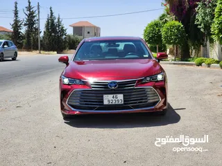  7 تويوتا افالون لون خمري حره جديد باسم المستورد 2021 فحص 3 جيد أعلى صنف بالاضافات بطاريه ليثيوم بسعر