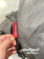  1 2عرباية اطفال بحالة الجديد ماركة l.f.c  أمريكي.....والثانية ستي بيبي