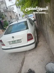  7 سكوده اكتافيه موديل 2002 ديزل جير عادي اصل عمومي لون ابيض مطور 1900 جير ومطور شغلات ميه ميه