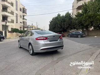  5 فورد فيوجن موديل 2014 مواصفات تيتانيوم نخب اول