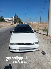  3 متسوبيشي ميراج 1990 ابيض باب واحد