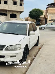  3 متشي لانسر معلمات 2002 كمبيو عادي محرك 18 مكانها الزواية  عيوب محرك فيه برنزيني مكيفه صاله ربي يبارك