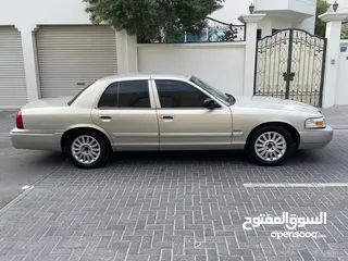  3 2011 model Mercury Grand Marquis