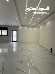  11 شقة شبه ارضي مع ترسات سوبر ديلوكس باجمل مناطق الجبيهة