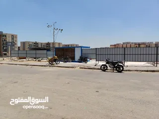  5 محل تجاري في منطقه 390 فدان في حداىق أكتوبر بجوار ابني بيتك السابعه و مشروع 557 عماره