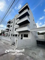  11 اخر شقة بالاقساط طابق ثاني في اجمل مناطق تلاع العلي باطلاله على شارع الجامعه