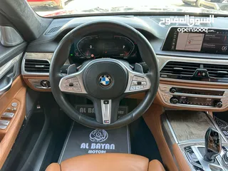  10 بي ام دبليو  750Li XDrive ذهبي داخل زعفراني خليجي