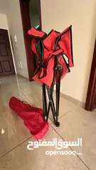  2 كرسي تخييم احمر جديد -"Red camping chair, new."