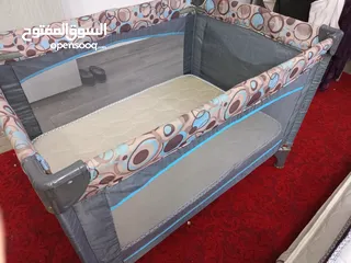  8 Folding Baby crib with 2 new mattress