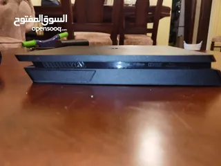  4 بلاستيشن 4 slim+يد اصلية+لعبتين