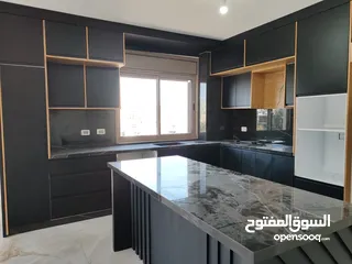  22 شقة جديدة سوبر ديلوكس للإيجار – عين منجد  قرب مطعم تغميسة