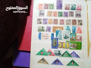  13 نيشان ملكى وزن41, 41 جرام من الدهب والفضه وعقدفضه من الاحجار الكريمه وطوابع قديمه نادره