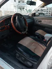  5 كيا سبكيترا للبيع موديل 2002 جير عادي نظيفة وشغل مقناة
