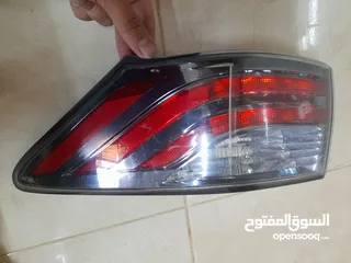  2 اضوية لكزس ct200 h  بحال الجديد وشانجان وتوسان وجولف كادي