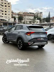  14 كيا سبورتاج ترخيص 2022 محرك 1600 هايبرد plug in/يقطع على الشحنه 65 كيلو متر