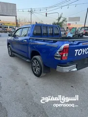  16 تويوتا هيلوكس 2020 دهان الشركه فحص كامل وله ملاحضه ممشى قليل لون مميز