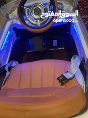  2 ‏ سيارة أطفال كهربائية مضاءة بالكامل وسماعات Children's electric car with lights and sound