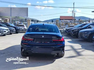  5 BMW 330E M PACKAGE