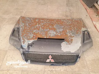  1 غطاء سيارة معدل أمامي ميتسوبيشي لانسر 2003 محتاج دهان فقط