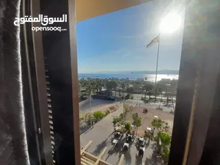  12 شقق فندقية بالعقبة مقابل البحر شقق مفروشة اطلاة بحرية موقع قريب الاسعار فترة العيد 70وفوق حسب الشقة