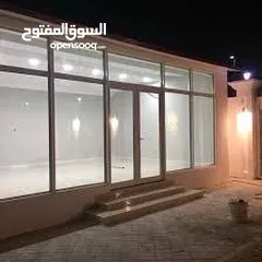  26 Aluminium room and partitions, glass window, door, kitchen cabinets