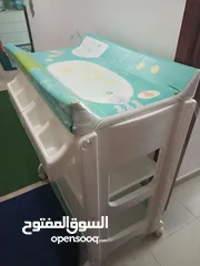  1 Juniors baby changing table with built-in tub