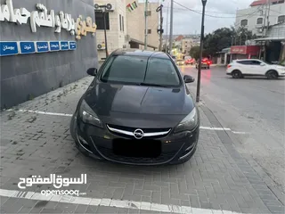 1 اوبل استرا 2013 دهان الشركة