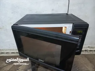  4 ميكرويف سونا 45لتر لون اسود مع نظام شواي داخليه بحال الوكاله قابل للتفاوض يوجد توصيل