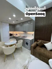  9 شقه كامله الخدمات غرفه وصاله بجوار اكبر بحيره صناعيه بأقل سعر بكل دبي