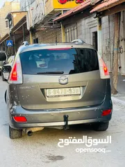  2 مازدا 5 ستيشن بابين سحاب ماتور 2000cc بدون تيربو هيك بجين هضول كراسي اماميات تدفئه كزاز كهرباء بنزين