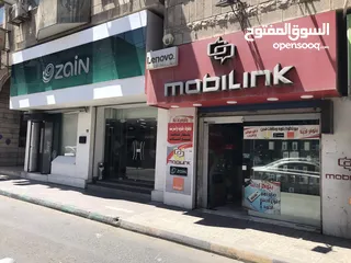  2 محل تجاري للبيع مجهز كامل موقع مميز ملاصق لمعرض شركة زين - شارع باب الواد - الوسط التجاري/ الزرقاء