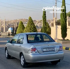 4 ميتسوبيشي لانسر 2010 فحص كامل بحالة الوكالة